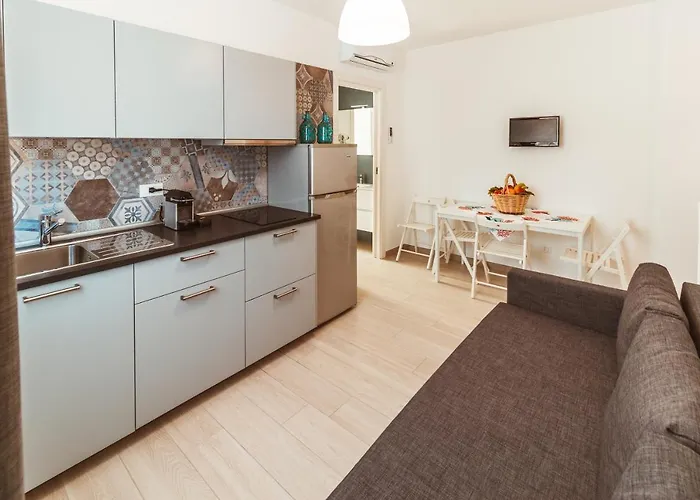 Fema Apartment & Rooms - Housea Couette-café